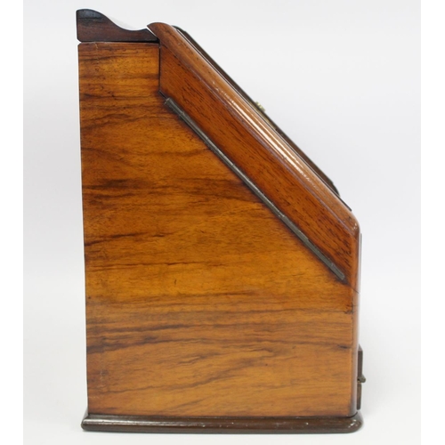 219 - Victorian burr walnut writing box of sloping rectangular form with twin hinged doors, pull out writi... 