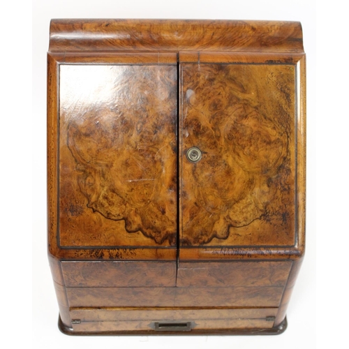 219 - Victorian burr walnut writing box of sloping rectangular form with twin hinged doors, pull out writi... 