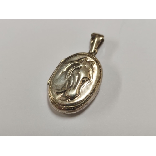 106 - Group of 925 silver to include pendant with a horse profile, moonstone-style pendant, amethyst-colou... 