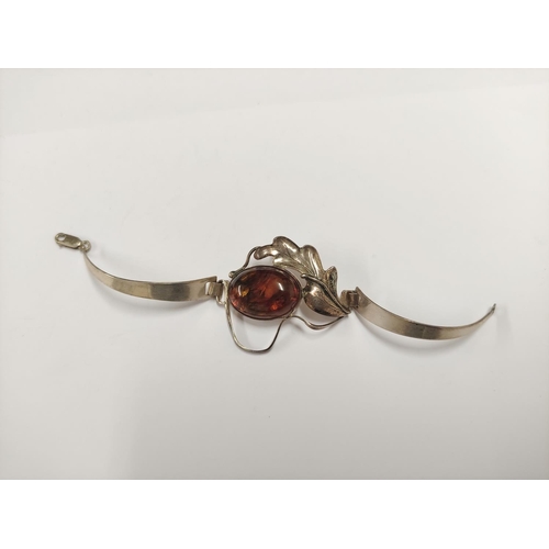 110 - Jewellery box containing miscellaneous costume jewellery to include amber-coloured bracelets, Scotti... 