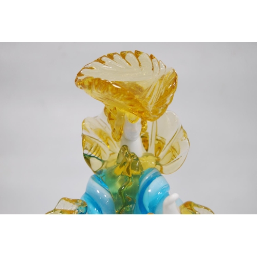 50 - Two Murano-style glass figures modelled as females and two Nao figures of girls.  (4)