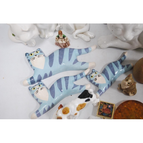 51 - Collection of ceramic and glass cat ornaments, glass paperweight and other glass ornaments.