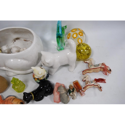 51 - Collection of ceramic and glass cat ornaments, glass paperweight and other glass ornaments.