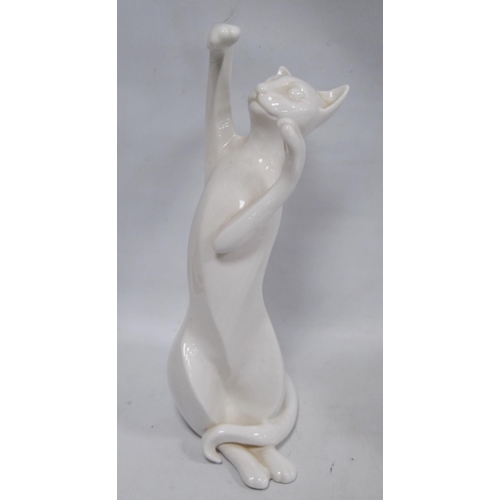 51 - Collection of ceramic and glass cat ornaments, glass paperweight and other glass ornaments.