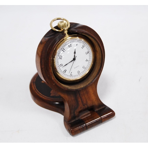 55 - Specimen-style inlaid stationery box, middle eastern-style inlaid box and a modern pocket watch in a... 