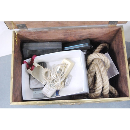 58 - Brass log box containing vintage telephones, accessories and a brass magazine rack, antique water pu... 