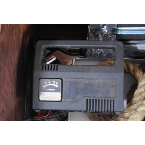 58 - Brass log box containing vintage telephones, accessories and a brass magazine rack, antique water pu... 