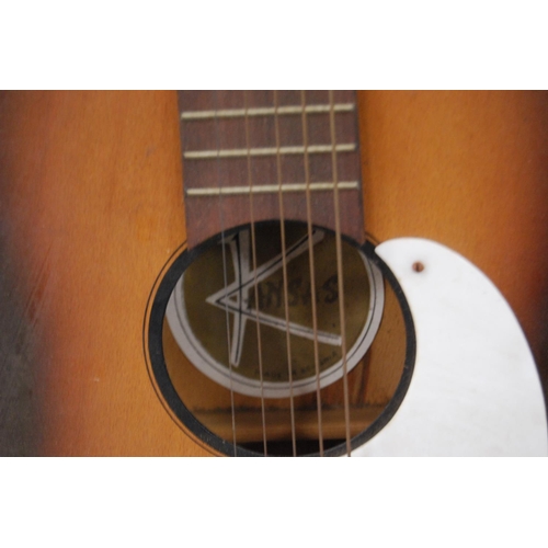 61 - Child's Kansas acoustic guitar.