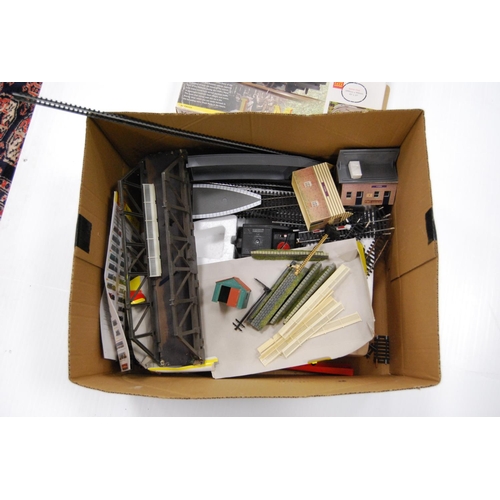 68 - Two cartons containing model railway rolling stock and track to include loose Hornby OO gauge track,... 
