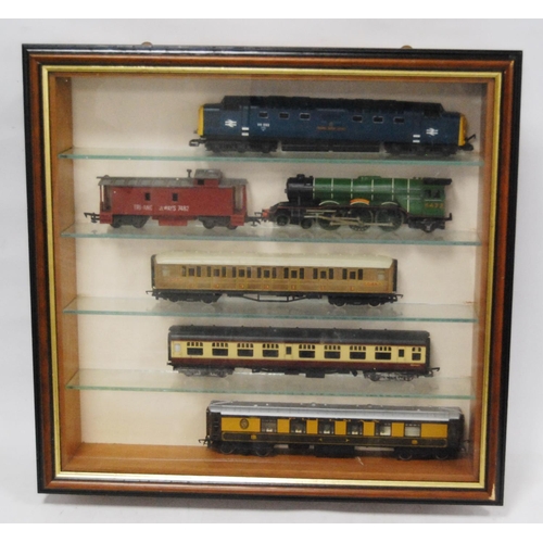 71 - Quantity of OO gauge model railway carriages and engines to include Flying Scotsman and others conta... 