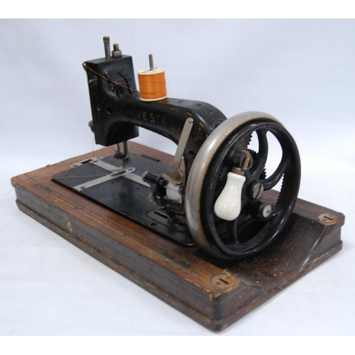 75 - Vesta portable sewing machine.
