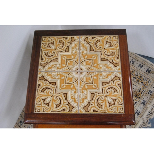 79 - Retro G Plan teak nest of three tables with tiled top.