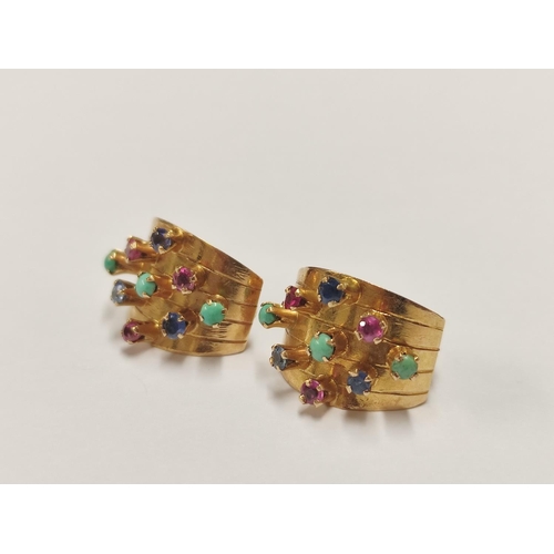 81 - Pair of Indian style yellow metal and gem-set earrings.