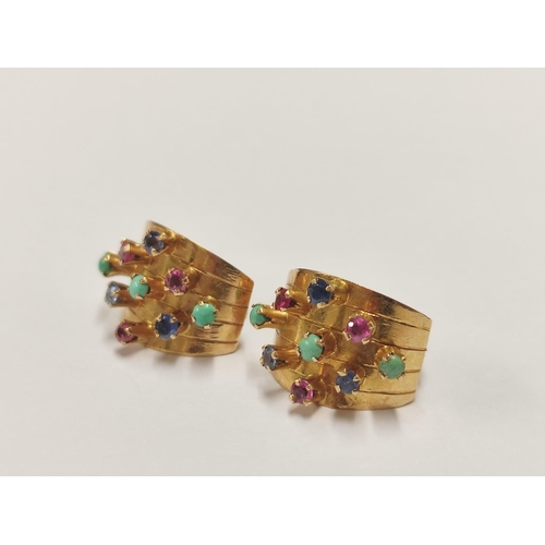 81 - Pair of Indian style yellow metal and gem-set earrings.
