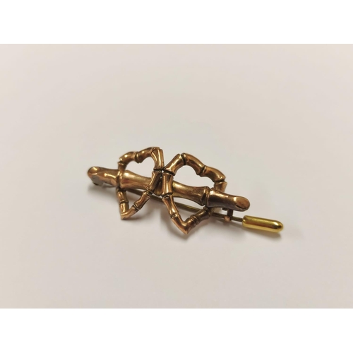 83 - 9ct gold heart-shaped bar brooch, 2.3g gross.