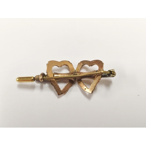 83 - 9ct gold heart-shaped bar brooch, 2.3g gross.