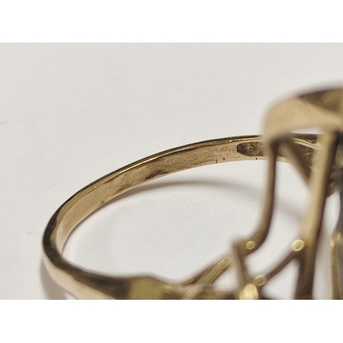 86 - 9ct gold and smoky quartz dress ring, 5g gross.