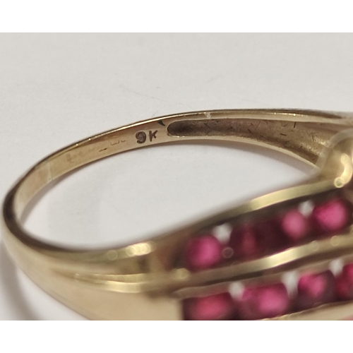 92 - 9ct gold ring set with small ruby-style stones, 2.9g gross.