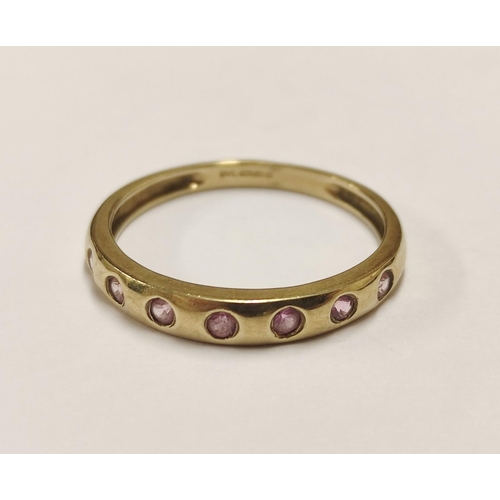 93 - 9ct gold ring set with pink stones, 1.8g gross.