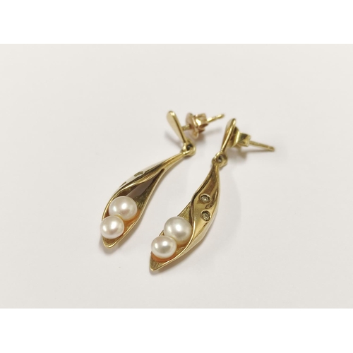 95 - Pair of 9ct gold and pearl-set earrings, 3.2g gross.
