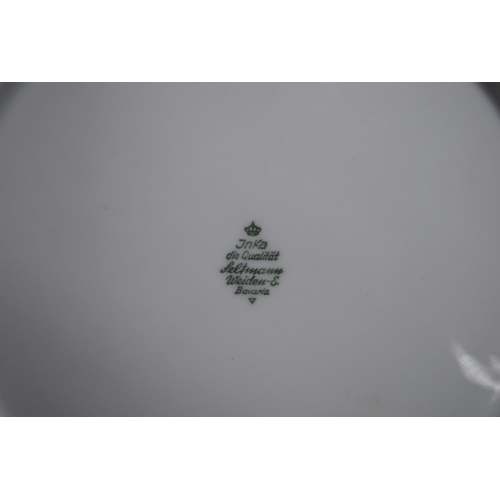 125 - Collection of Bavarian and Czechoslovakian porcelain dinnerwares, some with gilt decoration.