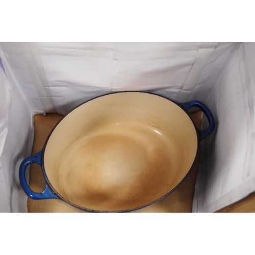 20 - Le Creuset blue glazed casserole dish, no. 25.