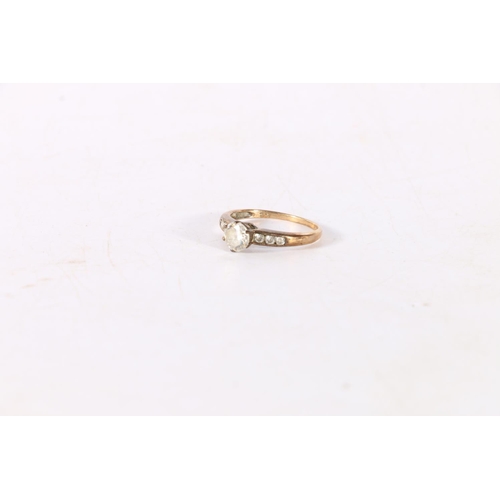 354 - 9K gold CZ set dress ring, 1.8grams.