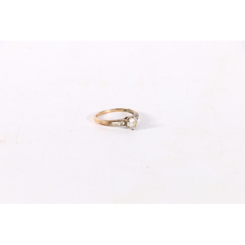 354 - 9K gold CZ set dress ring, 1.8grams.