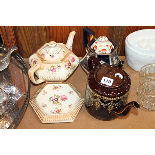 110 - Victorian teapot on stand, and two others.