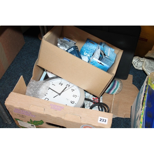 233 - Box containing ink cartridges, a clock, cases, etc.