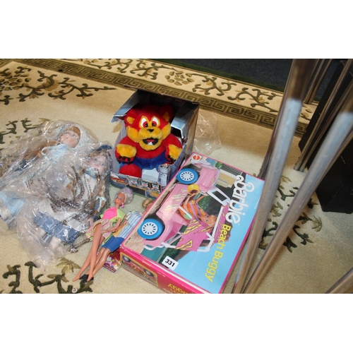 331 - Barbie beach buggy, boxed, two Barbies, two dolls and a bear.