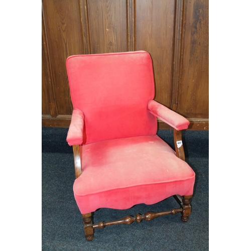 403 - Mahogany red upholstered open armchair.