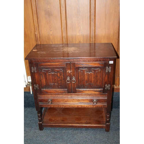 412 - Panelled oak two door hall cabinet, 79cm wide.