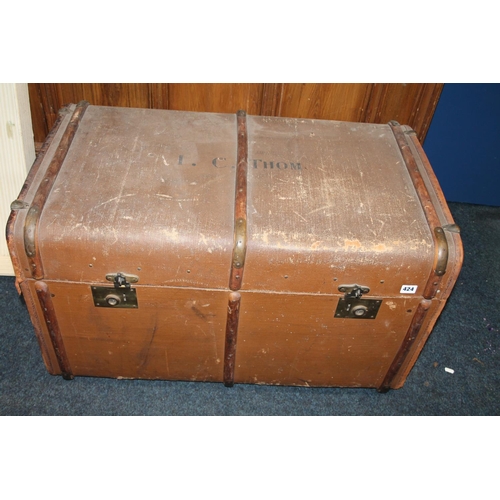 424 - Wood bound canvas trunk, 87cm wide.