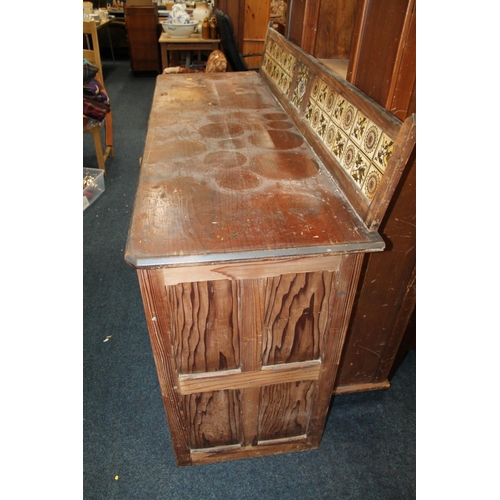 425 - Pitch pine sideboard, with three frieze drawers over three cupboard doors, 160cm wide.