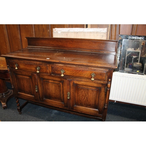 433 - Oak sideboard, raised on barley twist supports.