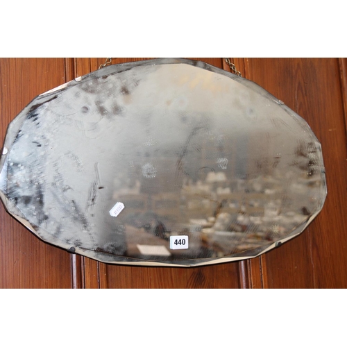 440 - Bevel-edged Art Deco frameless wall mirror, 64 x 36cm.