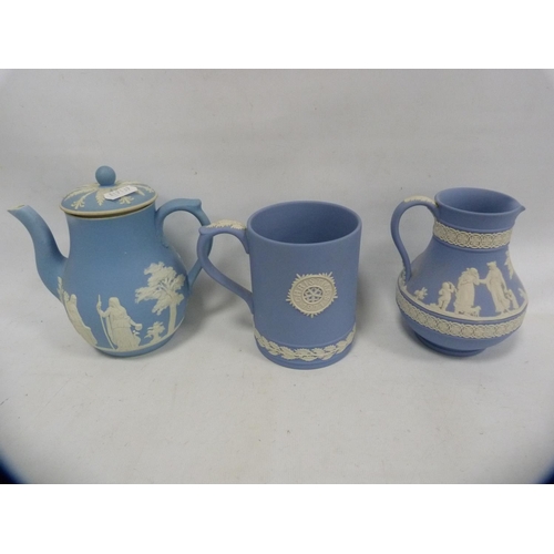 153 - Group of Wedgwood blue Jasper ware to include teapot, milk jug, circular jar and cover, scent bottle... 