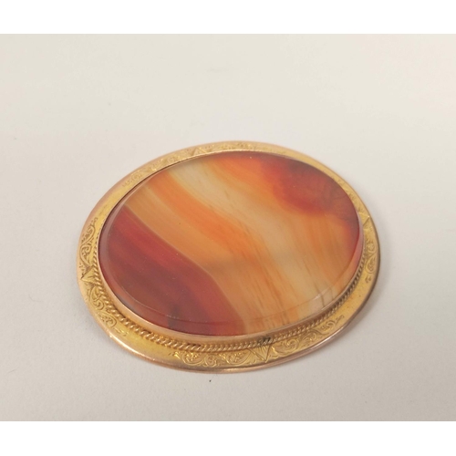 68 - Victorian oval chalcedony brooch in engraved gold '9ct', 47mm. 14g gross