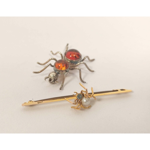 70 - Gold pin with gem set spider, another similar, silver and amber. 6g gross (2).