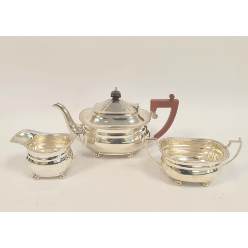 77 - Silver three-piece tea set, boat shape with gadrooned edges, by Elkington & Co. Birmingham 1967,... 