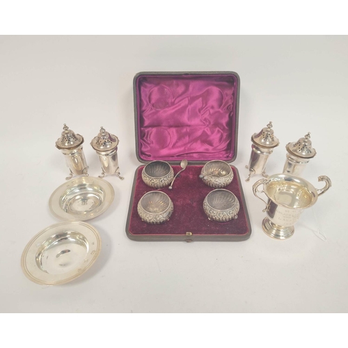 80 - Set of four silver pepperettes, a pair of Armada Dishes, 87mm and four salts, cased, 332g / 10oz.