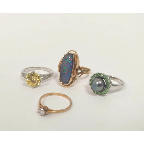 84 - Gold ring with oval opal doublet, another cubic zirconia and two silver rings. (4). 