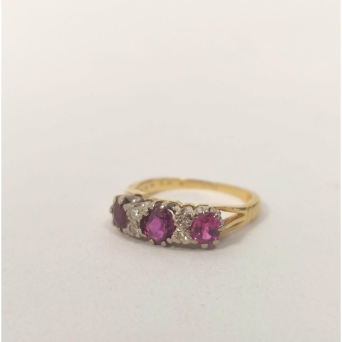 88 - Half hoop ring with three rubies and small diamond brilliants in gold '18ct'.