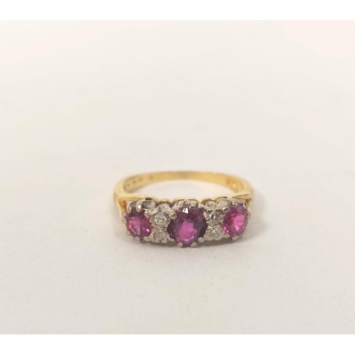 88 - Half hoop ring with three rubies and small diamond brilliants in gold '18ct'.