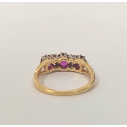 88 - Half hoop ring with three rubies and small diamond brilliants in gold '18ct'.