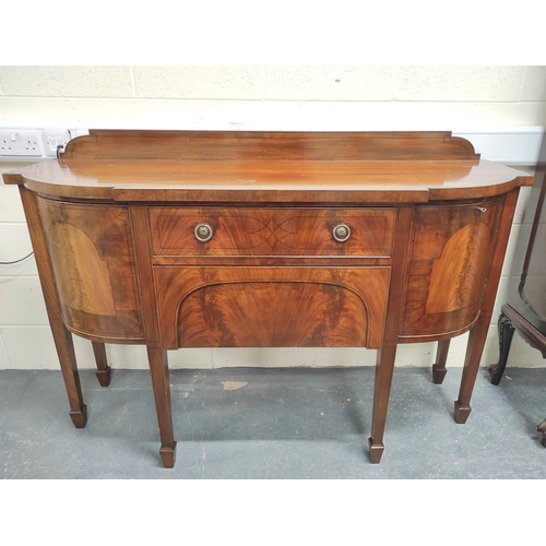 466 - Edwardian mahogany sideboard in the Sheraton style with ledge back and curved corner cupboards, cent... 