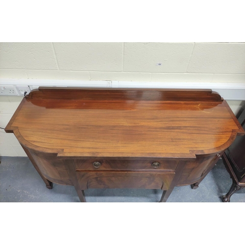 466 - Edwardian mahogany sideboard in the Sheraton style with ledge back and curved corner cupboards, cent... 