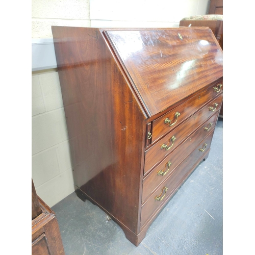 469 - Early 19th century mahogany bureau, the fall front enclosing fitted interior with conch shell oval a... 