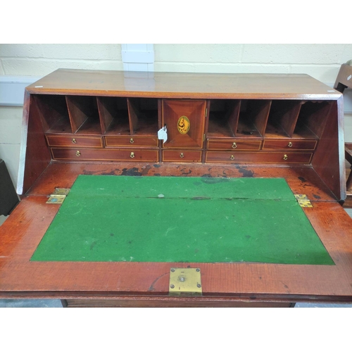 469 - Early 19th century mahogany bureau, the fall front enclosing fitted interior with conch shell oval a... 